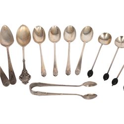 Collection of silver cutlery, including sugar tongs, coffee bean spoons, teaspoons, etc, all hallmarked