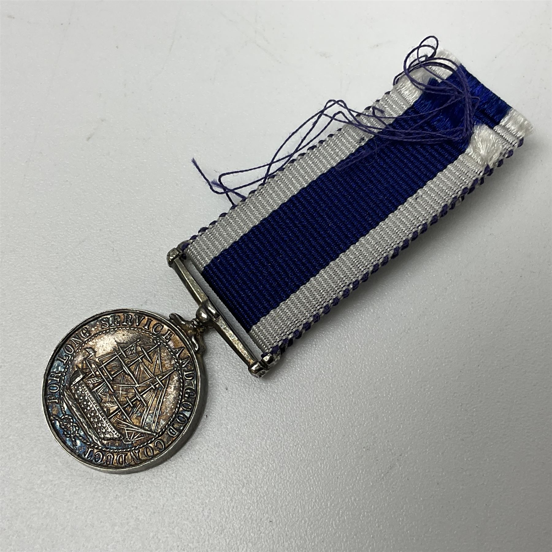 Eleven WW2 medals comprising three 1939-1945 war medals, two Defence medals, three 1939-1945 Stars, Atlantic Star, Africa Star and Italy Star; miniature QEII Naval LS & GC medal; all with ribbons; and WW2 postumous medal slip to Flight Sergeant L.N. Clark