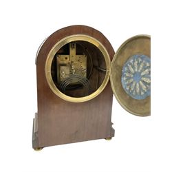 Manoah Rhodes & Son of Bradford, - Edwardian mahogany domed top mantle clock with a French 8-day movement striking the hours and half hours on coiled gong, case with inlaid stringing and raised on brass button feet, convex enamel dial with Roman numerals and steel spade hands. With pendulum and key.