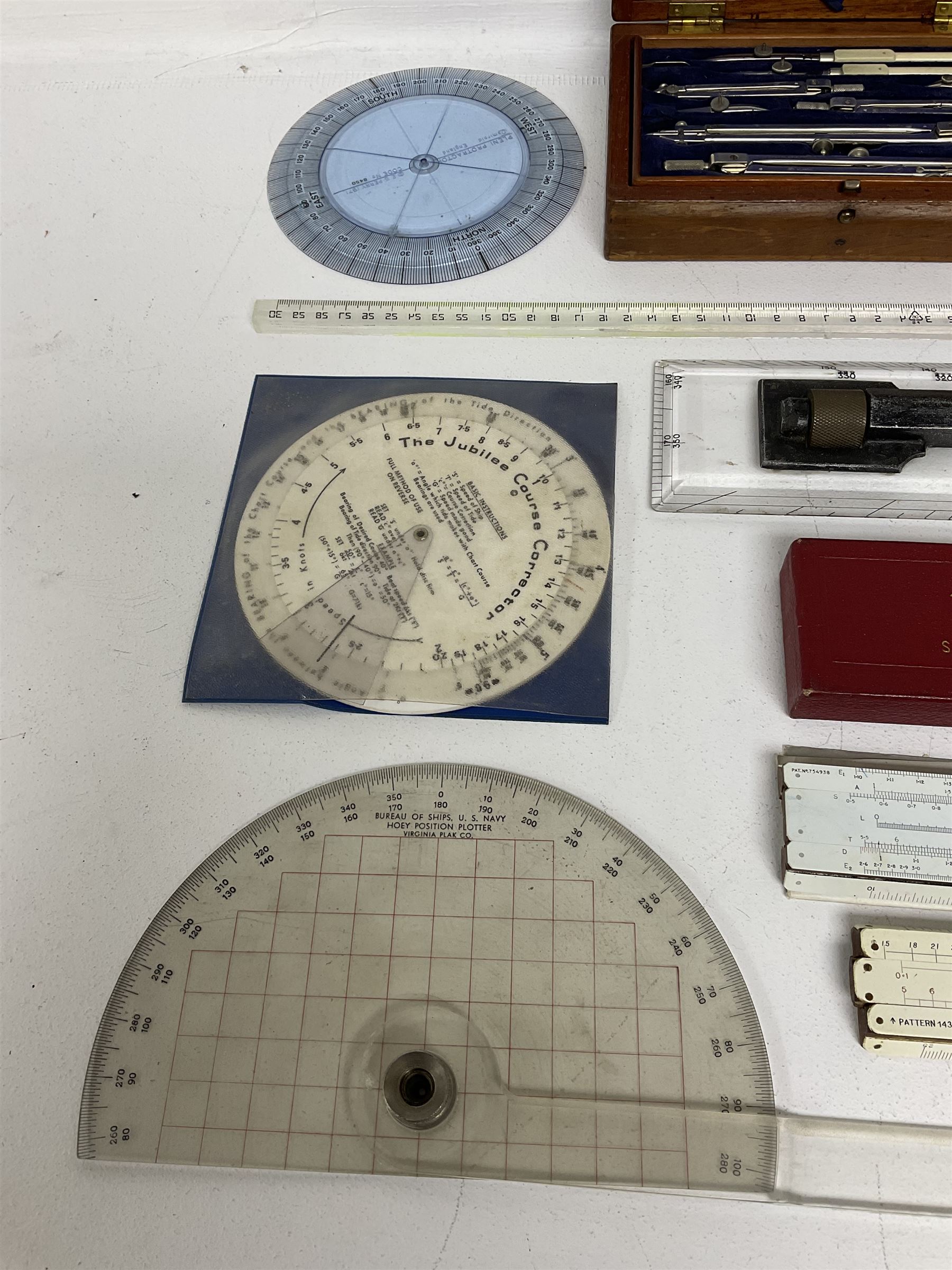 Brass 360 precision drafting protractor by Chadburn bros, in mahogany case, A G Thornton Drawing instruments in a mahogany case, together with P.I.C slide ruler, Nautical protractors etc 