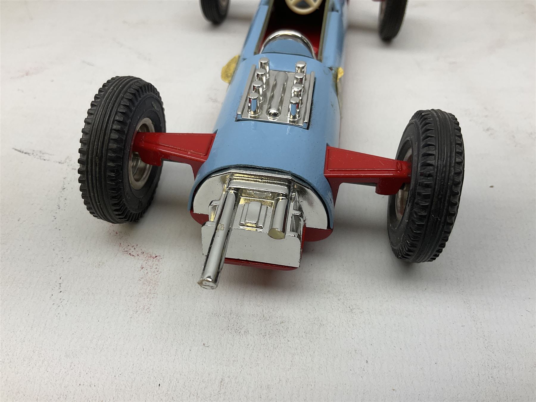 Various makers - Tri-ang Mini-Hi-Way Racing Car Series Le Mans No.9 racing car; Matchbox K-15 Merryweather Fire-Engine; Marx tin-plate Friction Helicopter; all boxed; and a Minic Motor Rally Adventure box containing a Jaguar Police car for spares or repair (4)