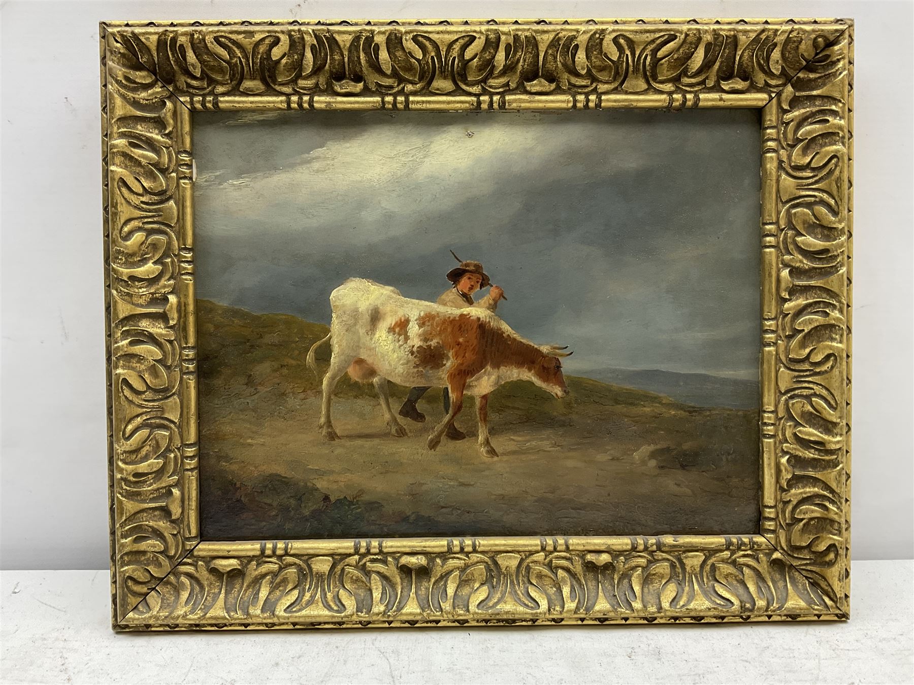 English School (18th/19th century): Farm Boy leading a Cow on a Moorland Track, oil on oak panel unsigned 21cm x 27cm