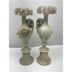 Pair of Continental alabaster urn form vases, decorated with roses and foliate vines, H44cm