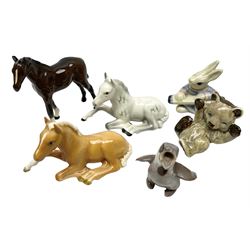 Three Beswick figures of horses, comprising Palomino foal 915, Dapple Grey foal and bay, together with Bing & Grondahl 1852 fledging sparrow modelled as a hungry baby bird and two other animal figures