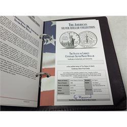 Five United States of America commemorative silver proof coins, comprising 1986, 1987, 1989, 1992 one dollars and 1982 half dollar, all with certificates