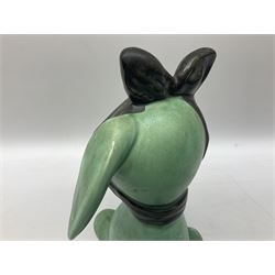 Sylvac 'toothache' dog in the green colourway, no 2451, with impressed beneath, H28.5cm