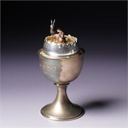 Anthony Gordon Elson -  Elizabeth II limited edition novelty silver and silver gilt surprise egg, the cup holding a gilt lined egg, bayonet opening to reveal two bunnies 4/200  H11cm London 1981