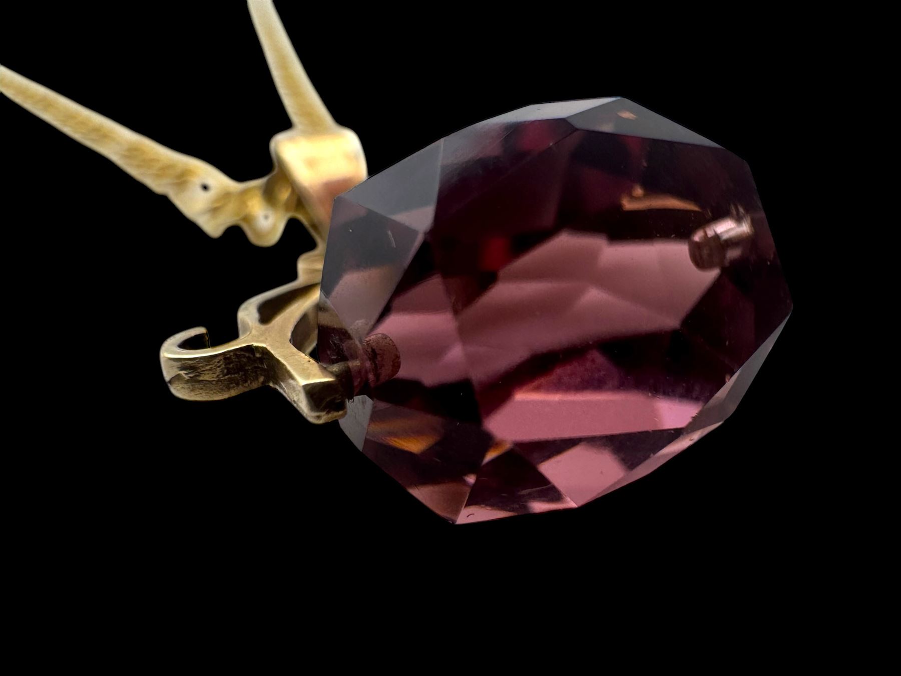 9ct gold amethyst glass spinner pendant, on 9ct gold chain necklace, both hallmarked