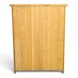 Indigo Furniture - large rustic oak cupboard with faux-drawer fronted cupboard, rectangular top above a cupboard door to the left with latch, a bank of four drawers to the right, metal cup handles raised on shaped supports