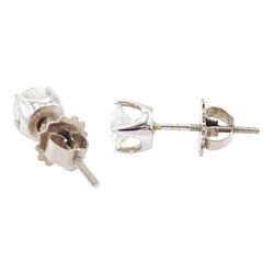 Pair of 18ct white gold round brilliant cut diamond screw back stud earrings, total diamond weight approx 0.75 carat