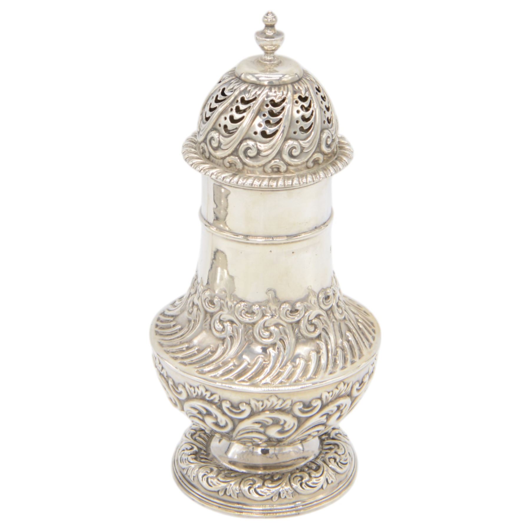 Late Victorian silver sugar caster, of typical waisted form, with embossed scrolling and foliate decoration and urn finial to removable pierced cover, upon circular foot, hallmarked Fenton Brothers, Sheffield 1895, H19cm