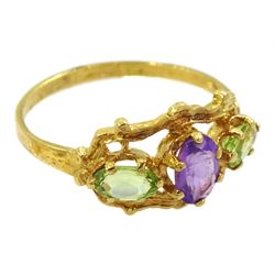 Silver-gilt three stone peridot and amethyst ring, stamped Sil