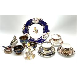 Two Royal Crown Derby paperweights, comprising Puffin with gold stopper, and Bullfinch Nesting with silver stopper, together with a Royal Crown Derby Imari 2451 pattern cup and saucer, a 19th century plate decorated in the Coalport style with panels of flowers within a blue band, an Royal Albert Old Country Roses teacup and saucer, a Crown Staffordshire teacup, saucer and side plate, three pierces of Victorian copper lustre, and a Coalport pastille burner. 
