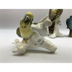 Karl Ens figure of a green woodpecker, modelled perched upon branch, model no. 7527, together with Karl Ens figure of budgie and Beswick Kingfisher no. 2371, all with printed marks beneath, tallest H25cm