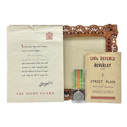 WWII Home Guard Service certificate to Albert John Pullinger with WWII Defence Medal; fretworked wooden Home Guard picture frame, image size 19 x 24cm; and WWII Civil Defence at Beverley (Yorks.) folding street plan (4)