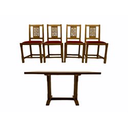 Yorkshire oak - oak dining table, rectangular top supported by four pillars on sledge supports and set four carved lattice back chairs