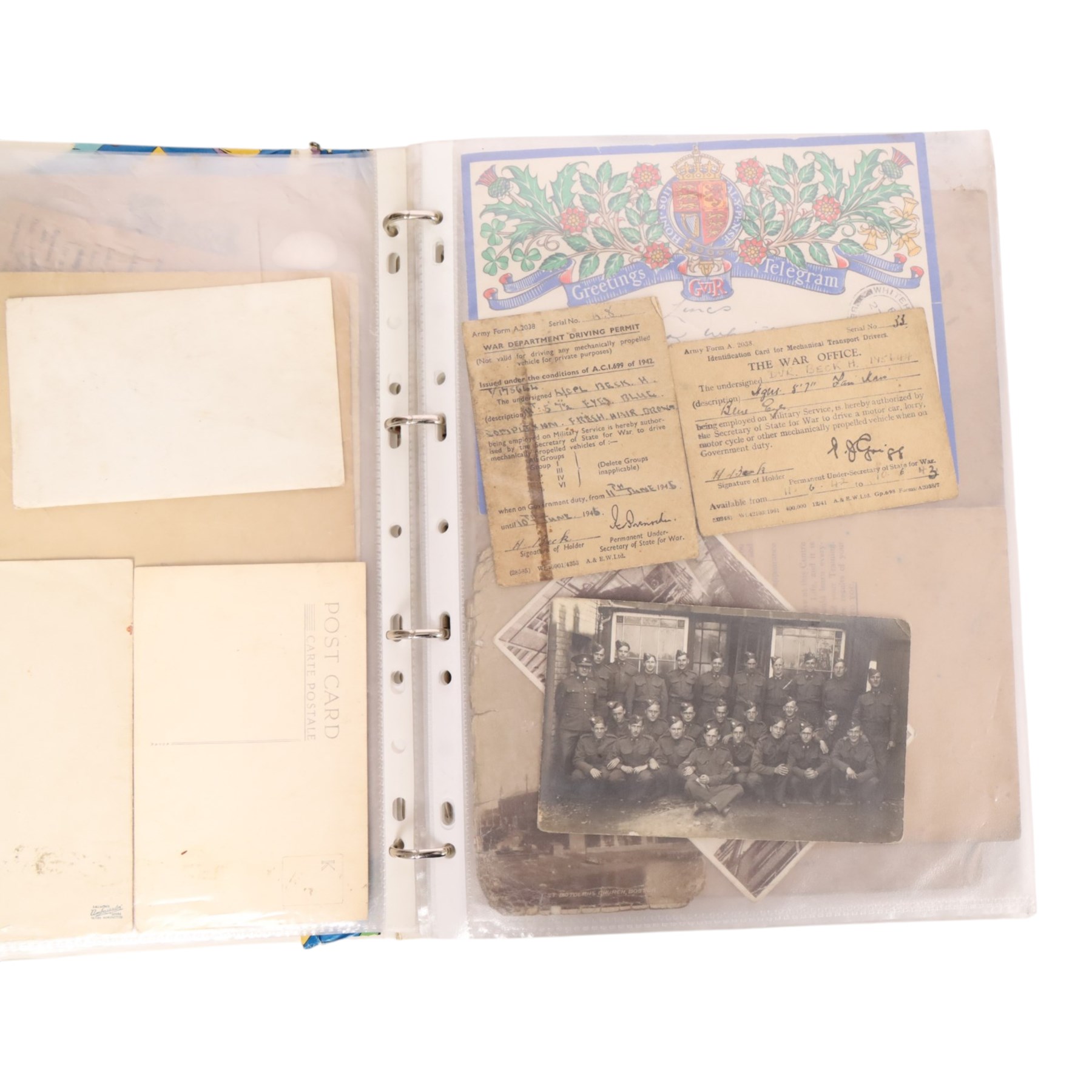 Collection of WWII ephemera, including photographs, postcards, identification cards, telegrams, newspapers 