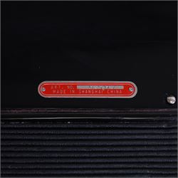 Bai-Le-20th century Chinese Piano Accordion, three octave keyboard with 96 treble buttons and 7 base keys, 16-fold bellows with shoulder straps and hard carrying case.