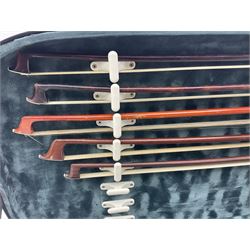 Modern trade case on wheels for carrying four violins and eight bows L94cm; together with five various bows