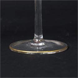 Pair of early 20th century Theresienthal Art Nouveau hand painted glass champagne coupes, the bowls hand painted with flowers, the bowl and foot rims lined in gilt, H13.5cm