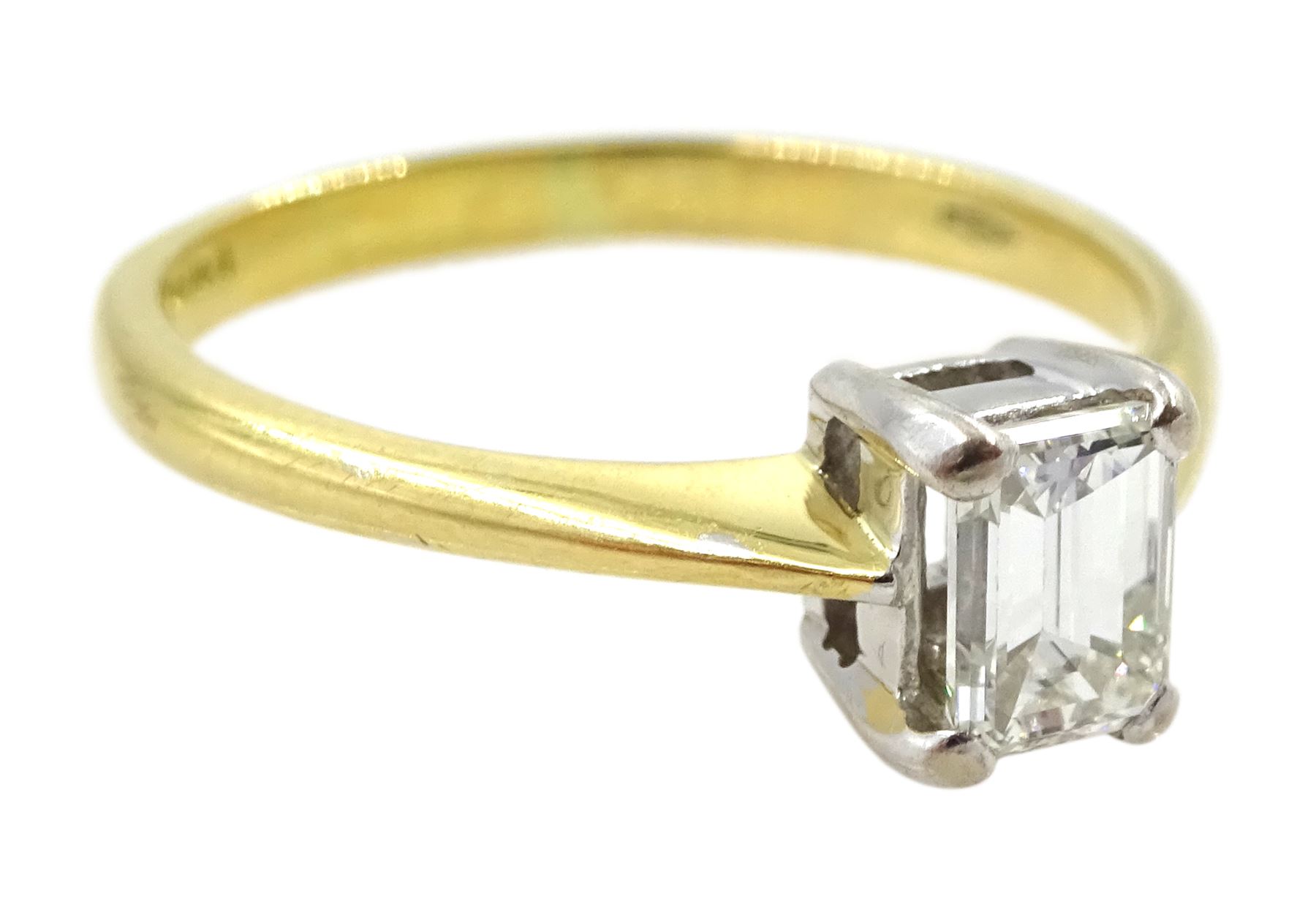 18ct gold single stone emerald cut diamond ring, London 2000, diamond approx 0.50 carat