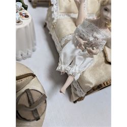 Dolls house bathroom and bedroom furniture, including bed, wardrobe, dresser filled with toiletries, shower, five figures, etc 