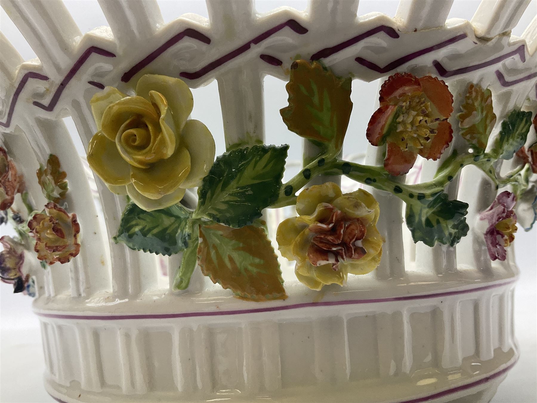 Early 20th century Dresden floral encrusted pierced bowl, centrally painted with flowers, on four tapering supports, D30cm 