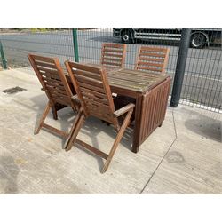 Rectangular teak drop leaf garden table, and four slatted armchairs