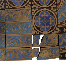 Minton & Co, Gothic Revival polychrome encaustic floor tiles, circa 1850, including six decorated with a central cardinal quatrefoil upon a blue ground, boarder tiles with scrolling vines and similar