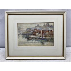 John Wynne Williams (British fl.1900-1920): Boats at Tate Hill Pier Whitby, with the Spa Ladder in the background, watercolour signed 16cm x 25cm