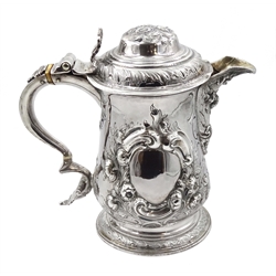 George III silver jug by William & Robert Peaston, London 1763 remodelled by Thomas Ellis Seagars, the spout hallmarked London 1863, approx 28oz, height 19cm