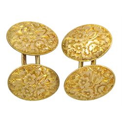 Pair of early 20th century 9ct gold cufflinks, with bright cut floral decoration, London 1929