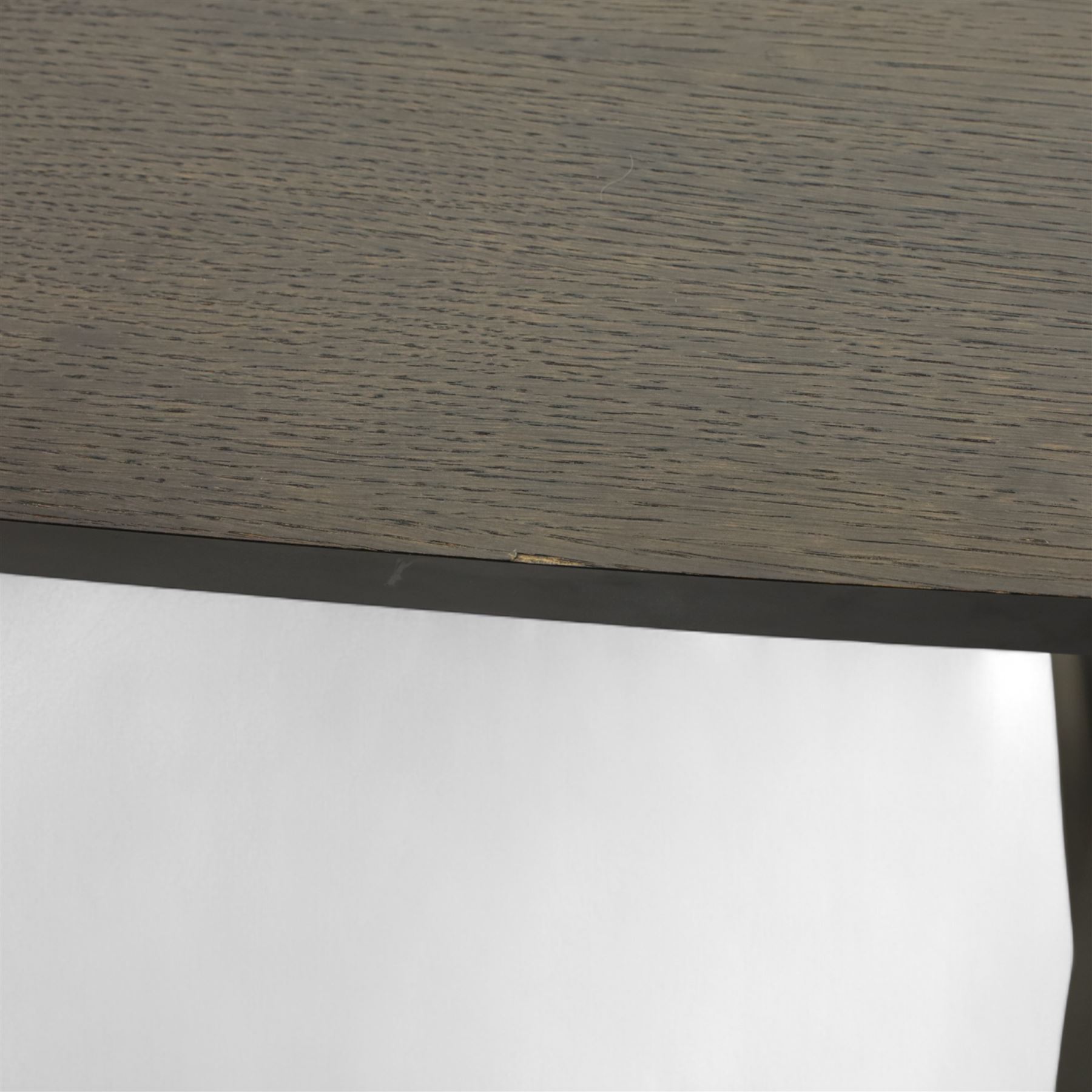 Contemporary black ash finish engineered wood hall table, with bow front top raised on a trestle style base 