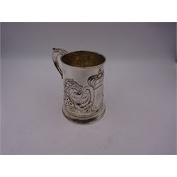George III silver tankard, of slightly tapering cylindrical from, with chased and repousse crown above a monogrammed cartouche and floral, foliate and C scroll decoration, with acanthus capped C scroll handle, hallmarked WT, possibly William Turton, London 1774, H11.5cm