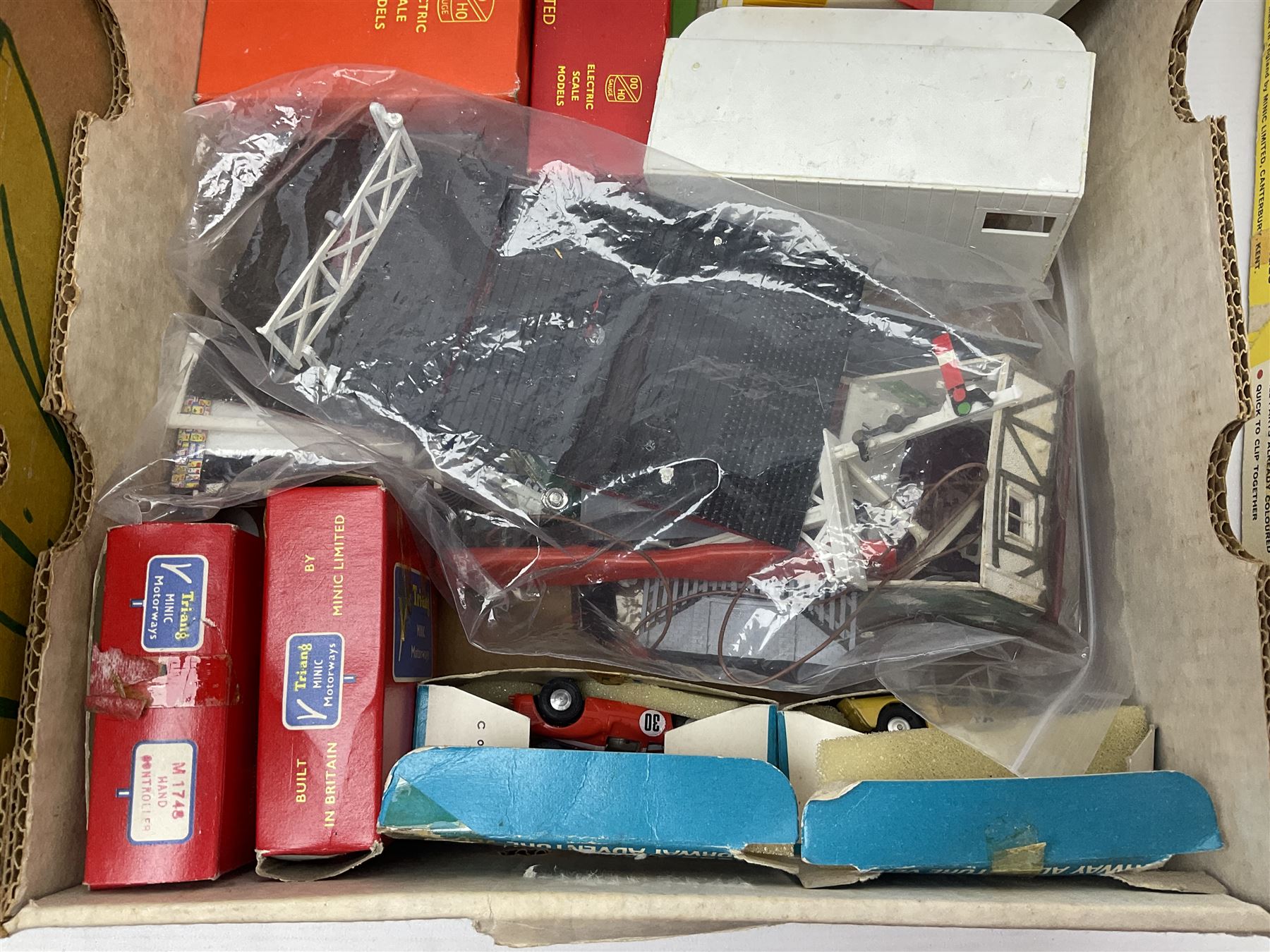 Tri-ang - quantity of '00' gauge model railway and Minic Motorways slot-racing items including Class B12 4-6-0 locomotive No.61572; boxed; seven goods wagons in five boxes; R576 Tunnel and Island Platform Set; both boxed; quantity of track and power unit; four Minic Cars and two controllers; boxed Customs Barrier and Frontier Post Set; railway car transporter and car loading ramp; quantity of track and trackside accessories; and boxed Car-Play Filling Station Set