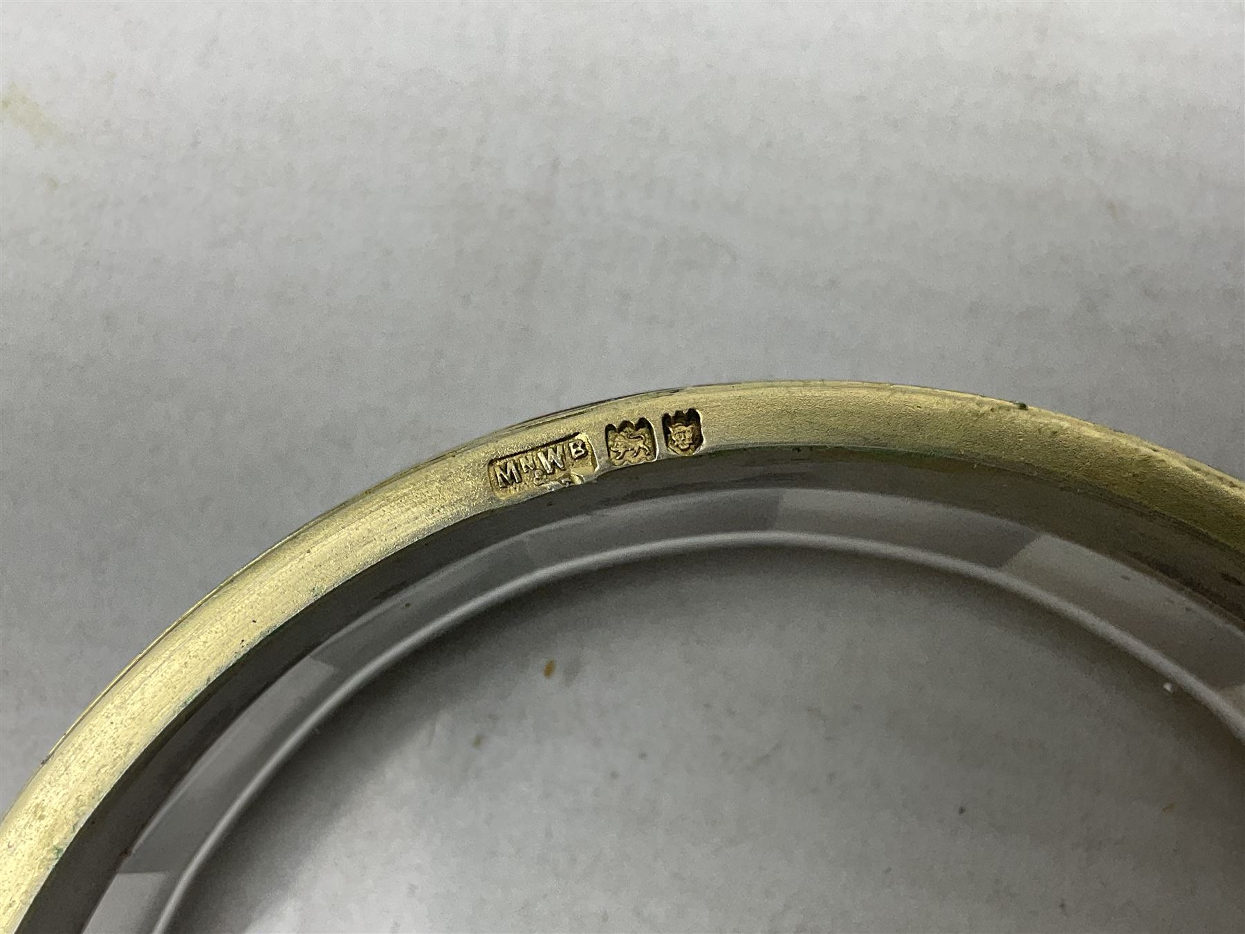 Pair of early 20th century glass dressing table jars, or circular facet cut form, with silver covers, hallmarked London, probably 1912