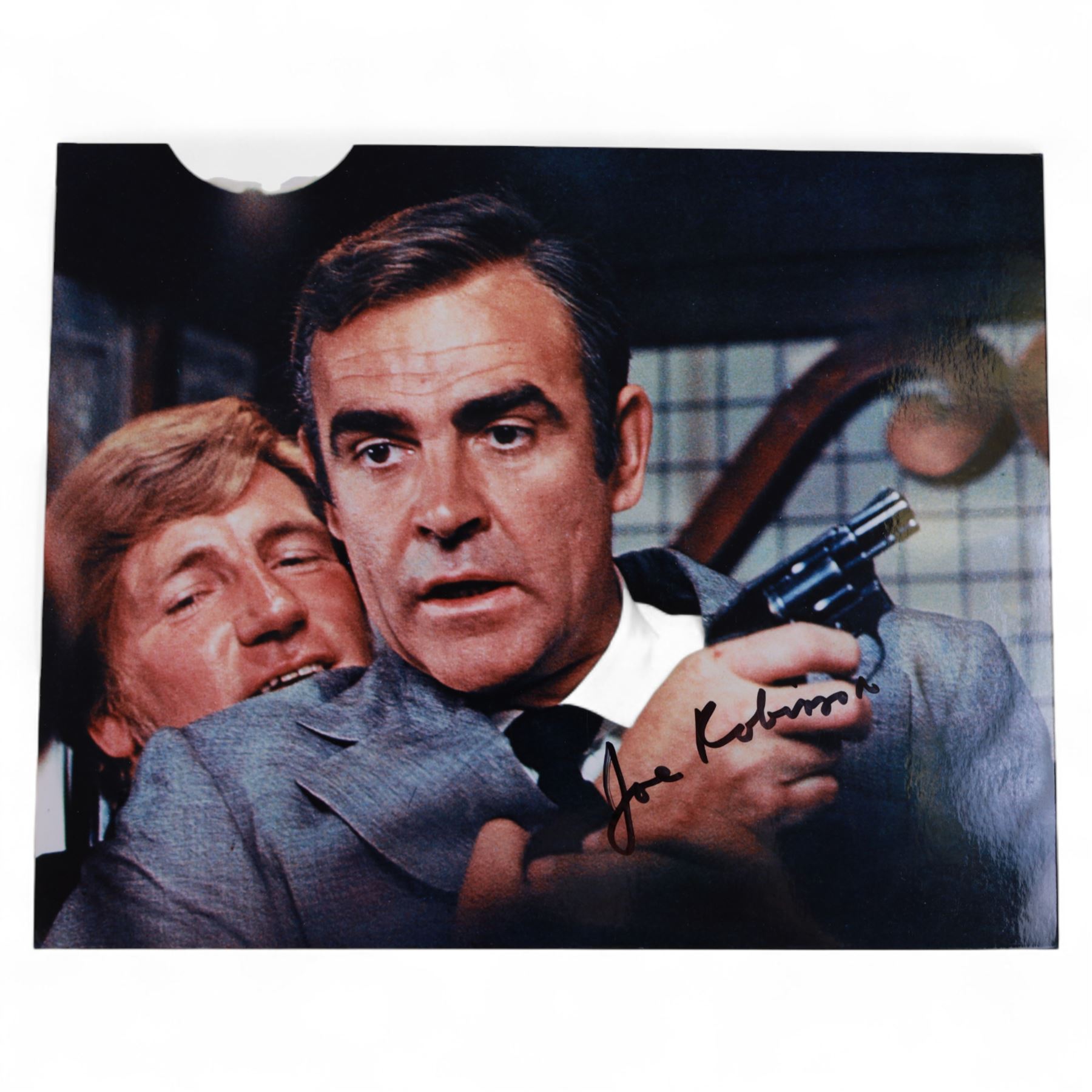 Collection of James Bond related signed film stills and promotional photographs, including Sean Connery and Pierce Brosnan promotional shots, Desmond Llewelyn, Octopussy poster, John Glenn, Blanche Ravalel, Geoffrey Holder and Julian Glover, all with certificates of authenticity