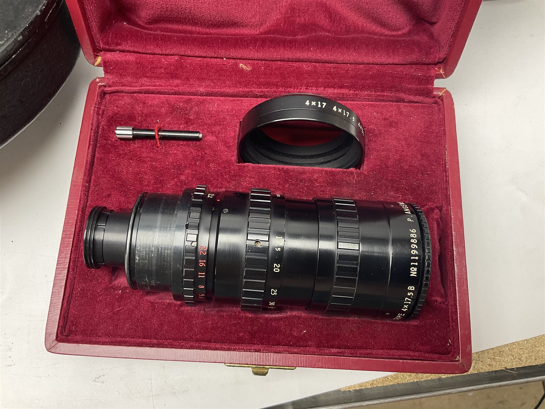 Arriflex 16 camera body, serial no. 11250, three 400ft magazines, cased filter set, 'Angenieux-Zoom Type 4x17.5B F.17.5-70mm' lens, serial no. 1199886 cases and other Addiflex equipment in hard case 