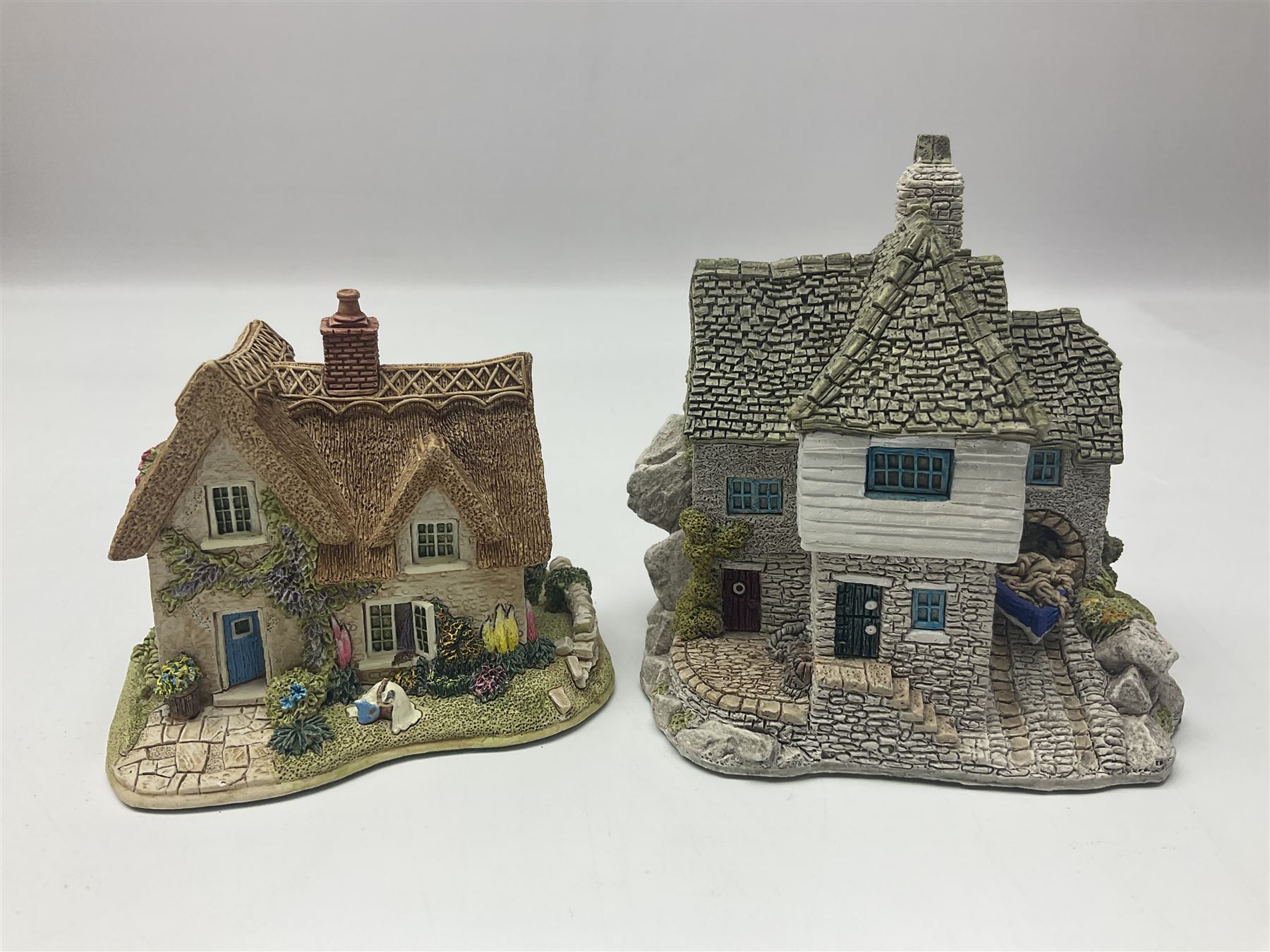 Ten Lilliput Lanes, comprising from Midlands Region Witham Delph, Jun and Disorderly, From South West Region Puffin Row, Moonlight Cove, The Cuddy, and from South West Region, The Rustlings, Saxton Cottage (1988), Marigold Meadow, Calendar Cottage and Little Lupins, all with boxes and deeds 