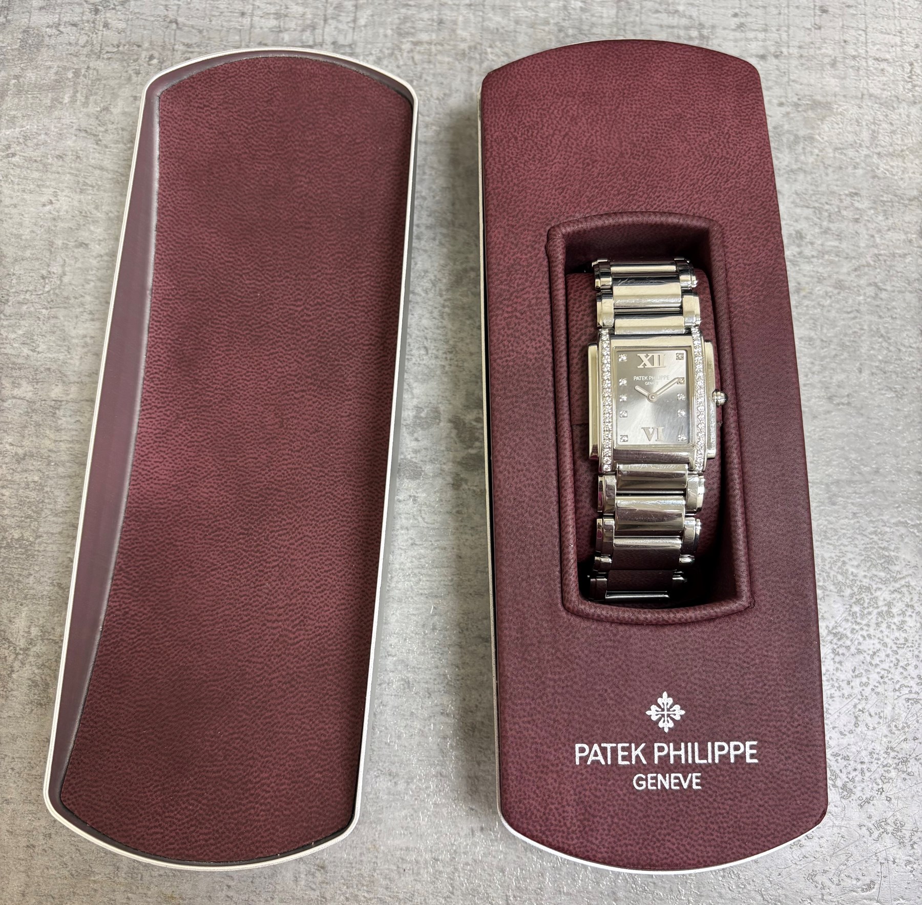 Patek Philippe Twenty~4 ladies stainless steel quartz wristwatch, sunburst grey dial with Roman numeral and diamond dot hour markers and diamond set case, on original bracelet, with fold-over clasp boxed