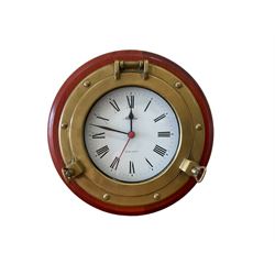 20th century marine clock with a mahogan