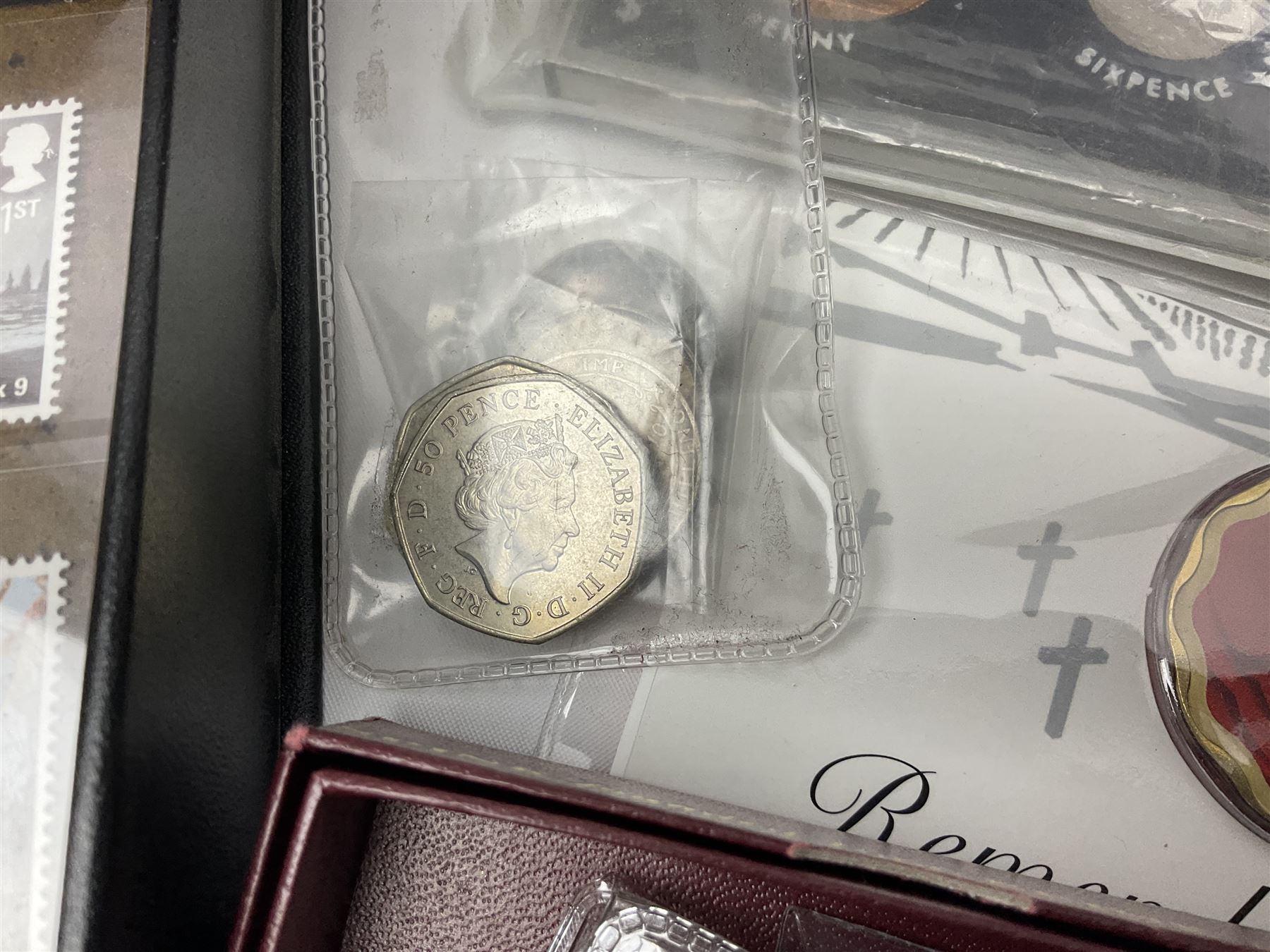 Commemorative and other coinage, including various Queen Elizabeth II 'London 2012 sports collection' fifty pence coins on cards, commemorative crowns, Millennium 2000 'Time Capsule' coin set, channel islands old round one pound coins, part sets etc