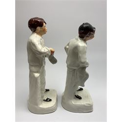 A pair of Staffordshire figures, The Newspaper Seller, and Shoe Shine Boy, H31cm