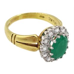 18ct gold oval emerald and round brilliant cut diamond cluster ring, London 1979