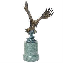 After Jules Moigniez - bronze figure of an eagle poised to attack, upon green marble base, overall H50cm