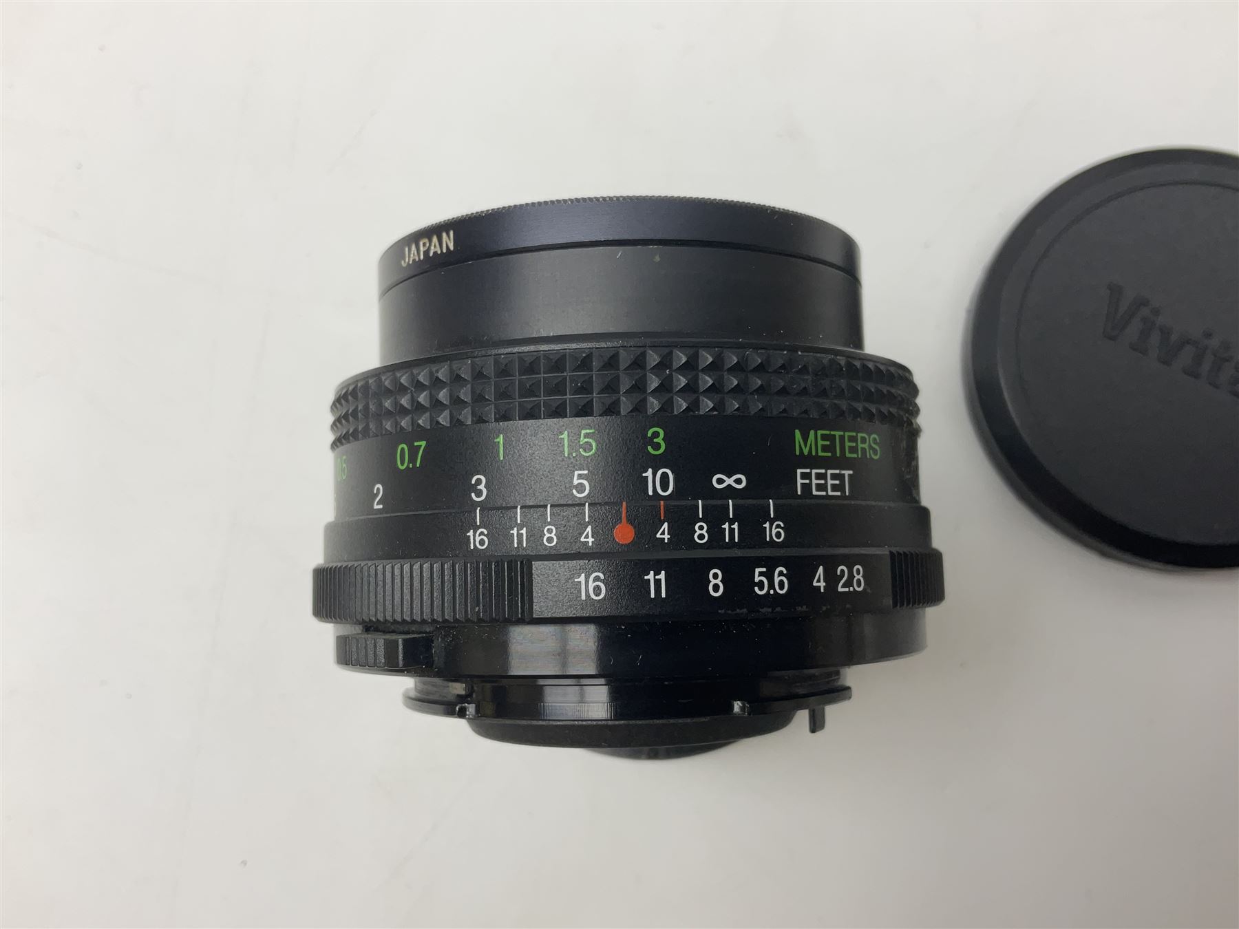 Olympus OM-1 camera body, serial no 913212, with 'Olympus OM-System F.Zuiko Auto-S 1:1.8 f=50mm' lens, serial no.74374, 'Vivitar wide angle MC 28mm 1:2.8 49mm' lens, serial no. 42042268, and Olympus OM winder 2