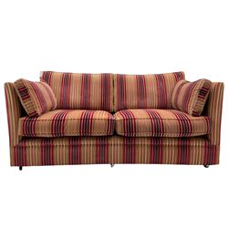 Contemporary two seat sofa, with loose cushions, upholstered in stiped fabric
