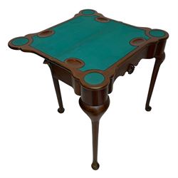 Victorian mahogany card table, the shaped fold-over top reveals baize playing surface and sunken counter wells, the shaped frieze rail mounted by carved leaf motif, double gate-leg base, on cabriole supports 
