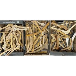 Quantity of early 20th century and later wooden advertising coat hangers including Grey & Wilkinson, John Ainsworth, Austin Reed and others, together with similar advertising brushes, in three boxes