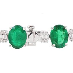 18ct white gold emerald and diamond bracelet, fifteen oval cut emeralds, spaced by clusters of baguette cut and round brilliant cut diamonds, stamped, total emerald weight approx 15.15 carat, total diamond weight approx 1.85 carat